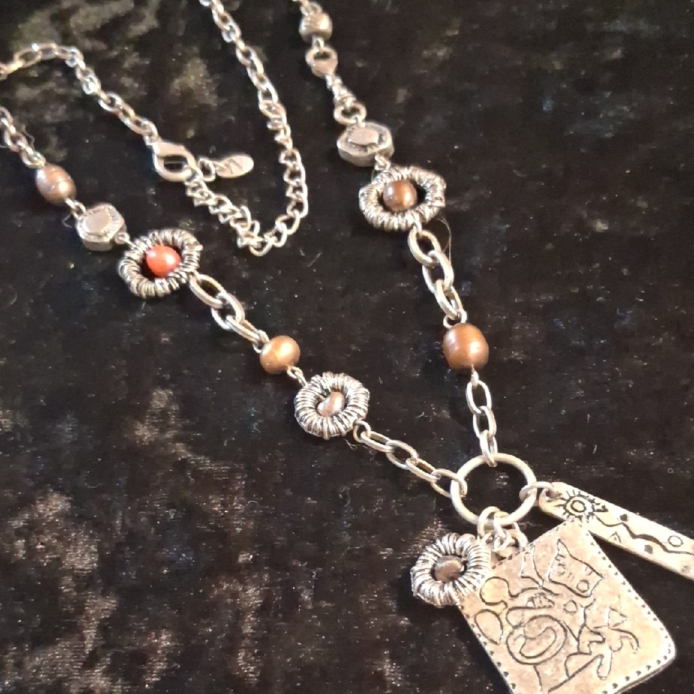 Nena & Co Silver and Brown Necklace with Charms